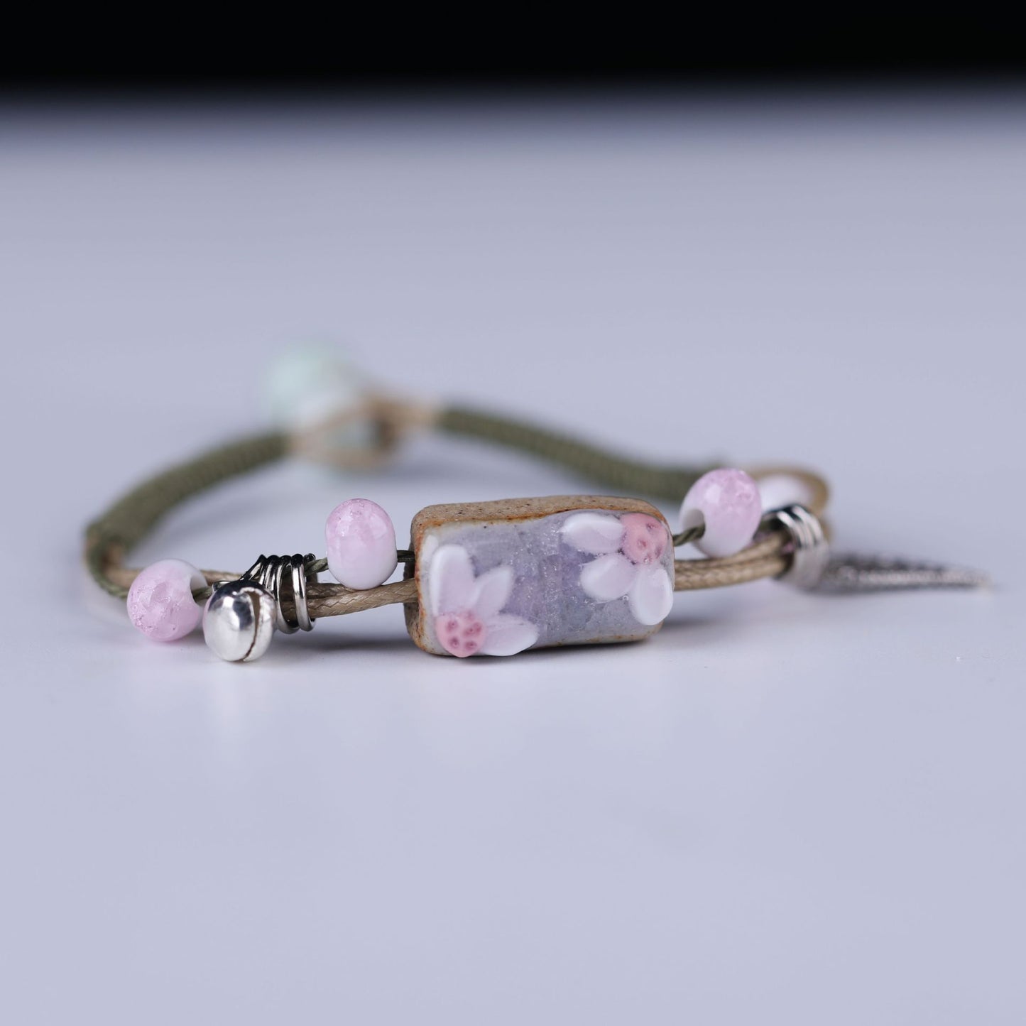 Embroidered Cowhide Bracelet with Alloy Notes
