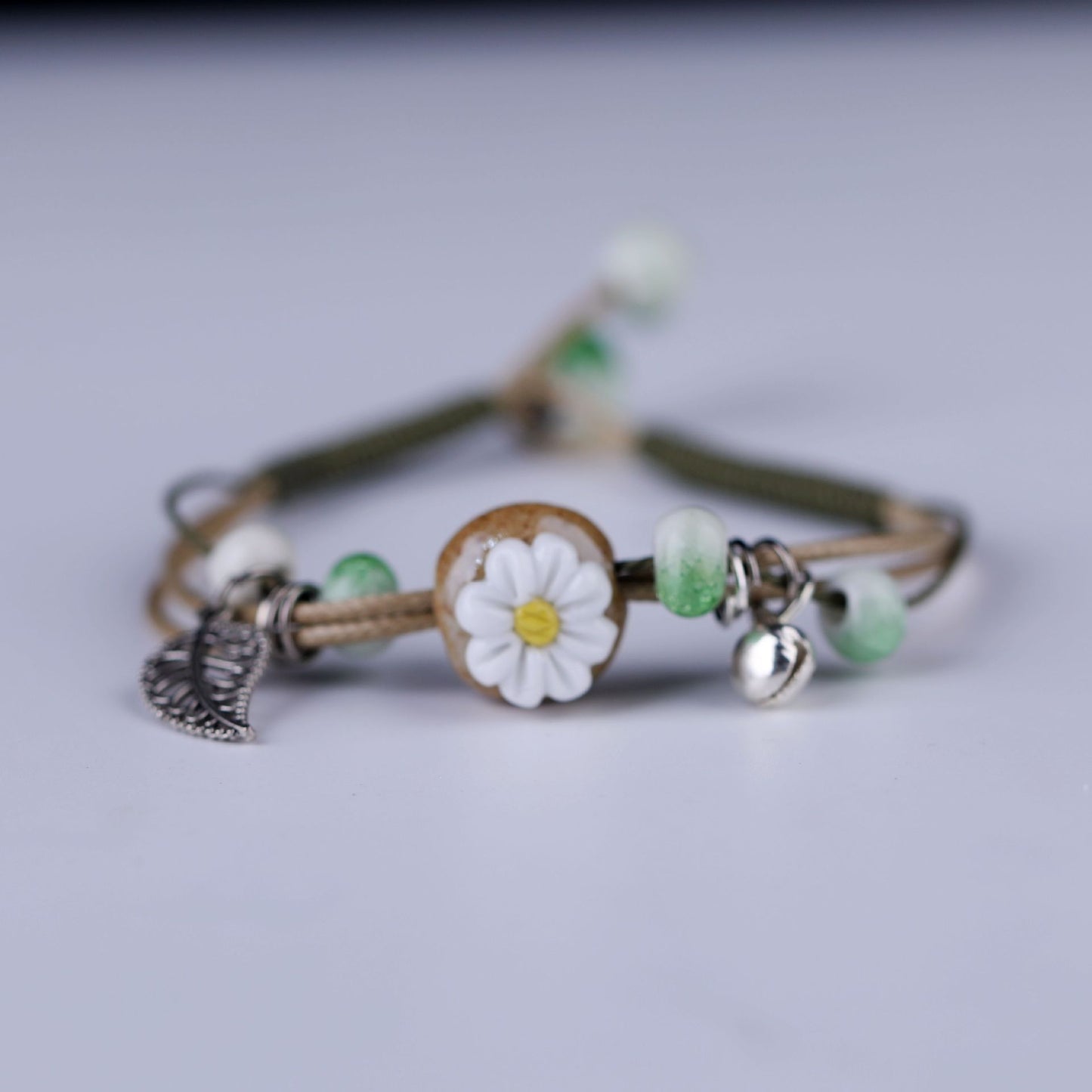 Embroidered Cowhide Bracelet with Alloy Notes
