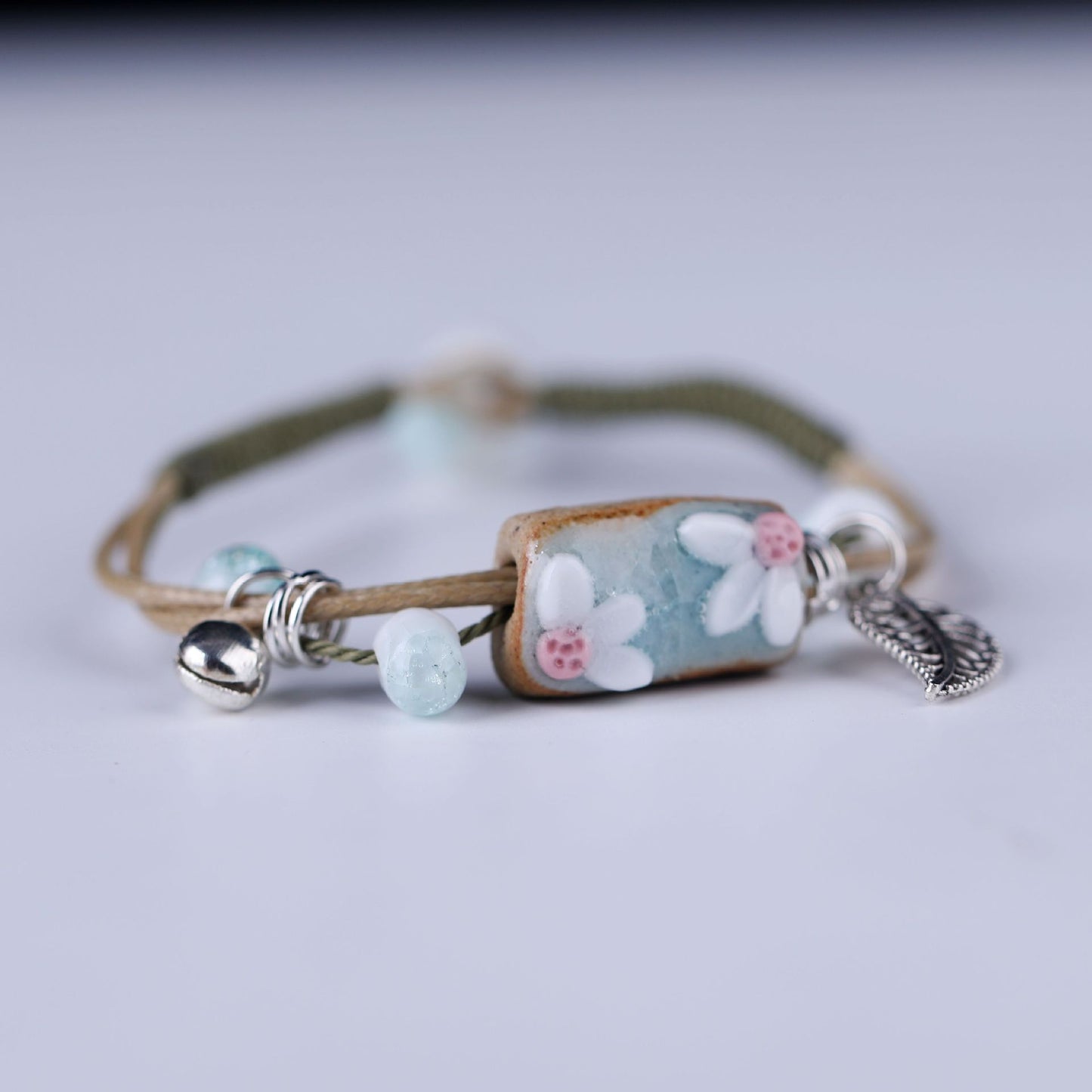 Embroidered Cowhide Bracelet with Alloy Notes