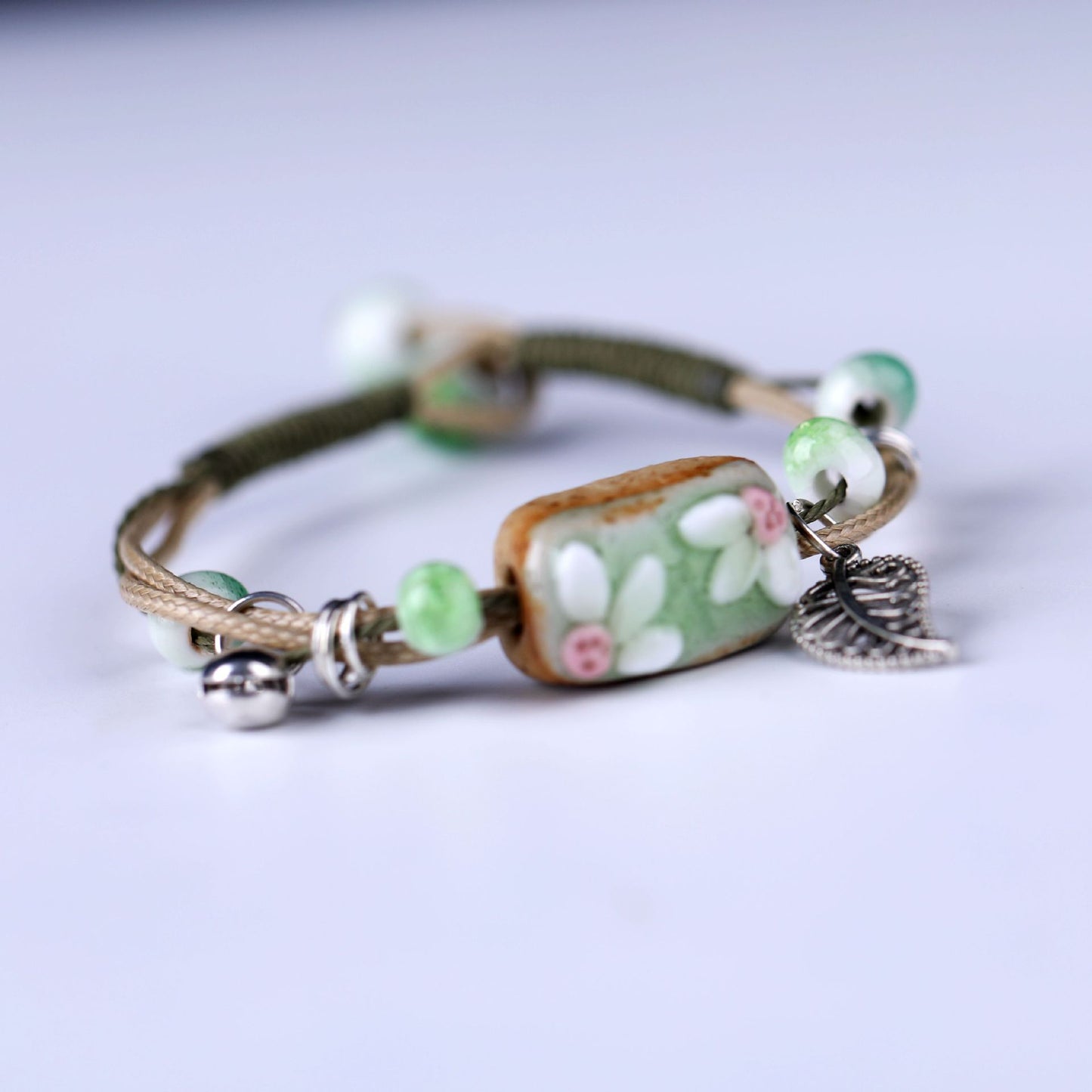 Embroidered Cowhide Bracelet with Alloy Notes